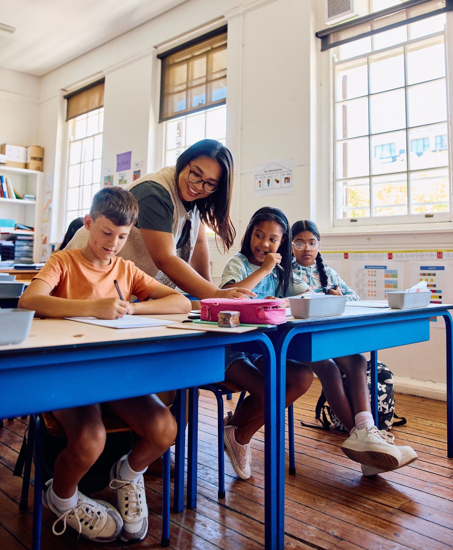 Teacher with students in classroom
